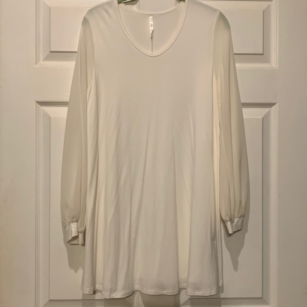 Pastels women’s top. Creamy white. XL. See through sleeves. 32” Long